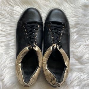 Torrid black and gold sneakers